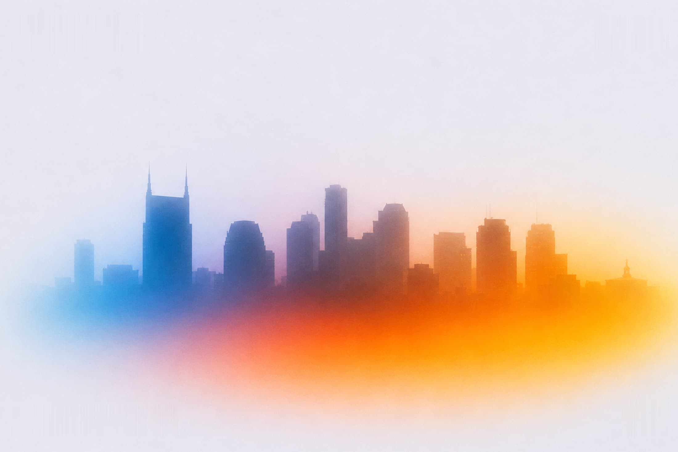 The Nashville skyline against a wash of colour